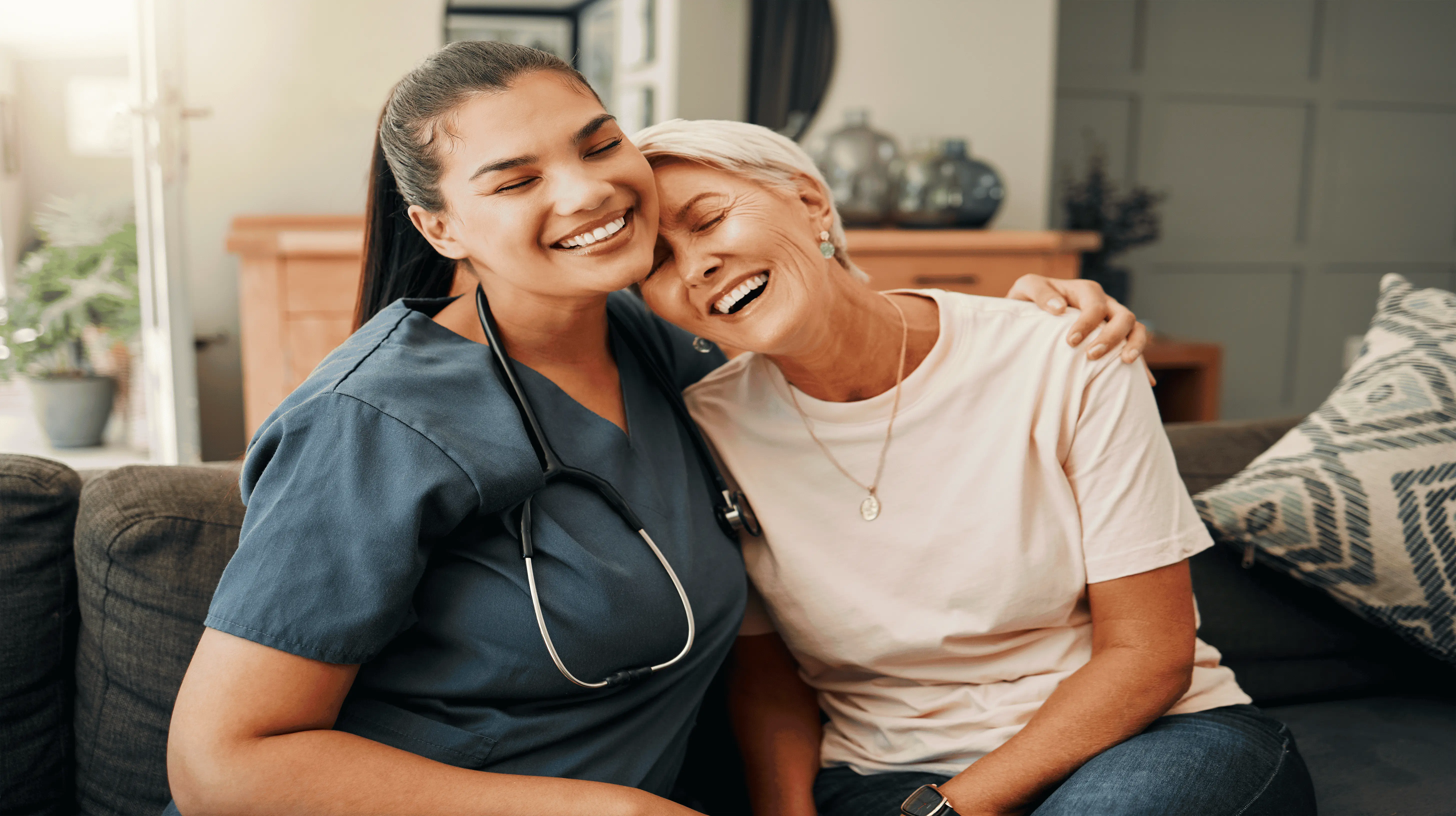 OC HomeCare nurse providing compassionate dementia and emotional support to a senior woman in a warm Fullerton, CA home