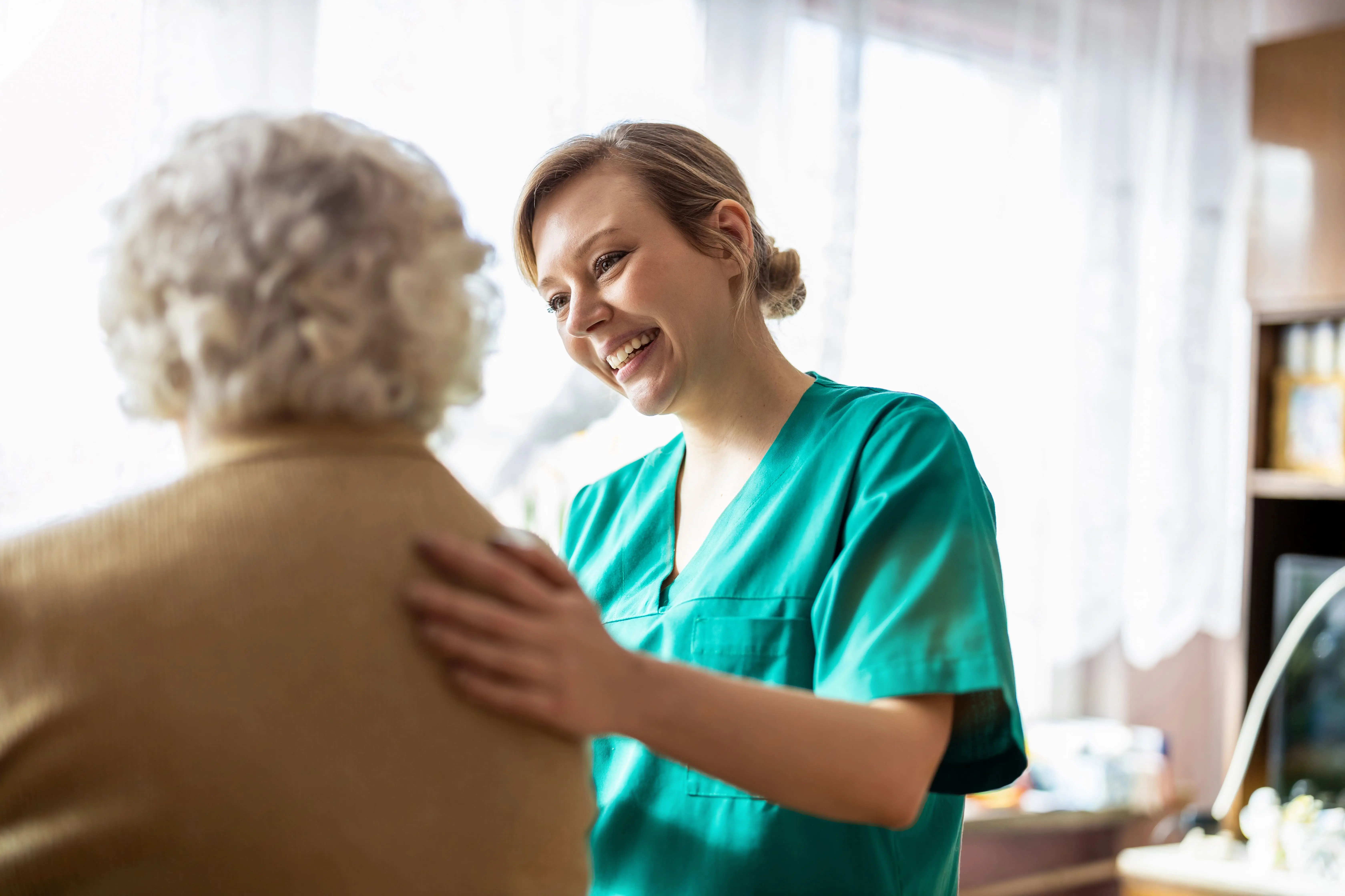Smiling OC Homecare caregiver providing flexible, personalized in-home senior care in Orange County