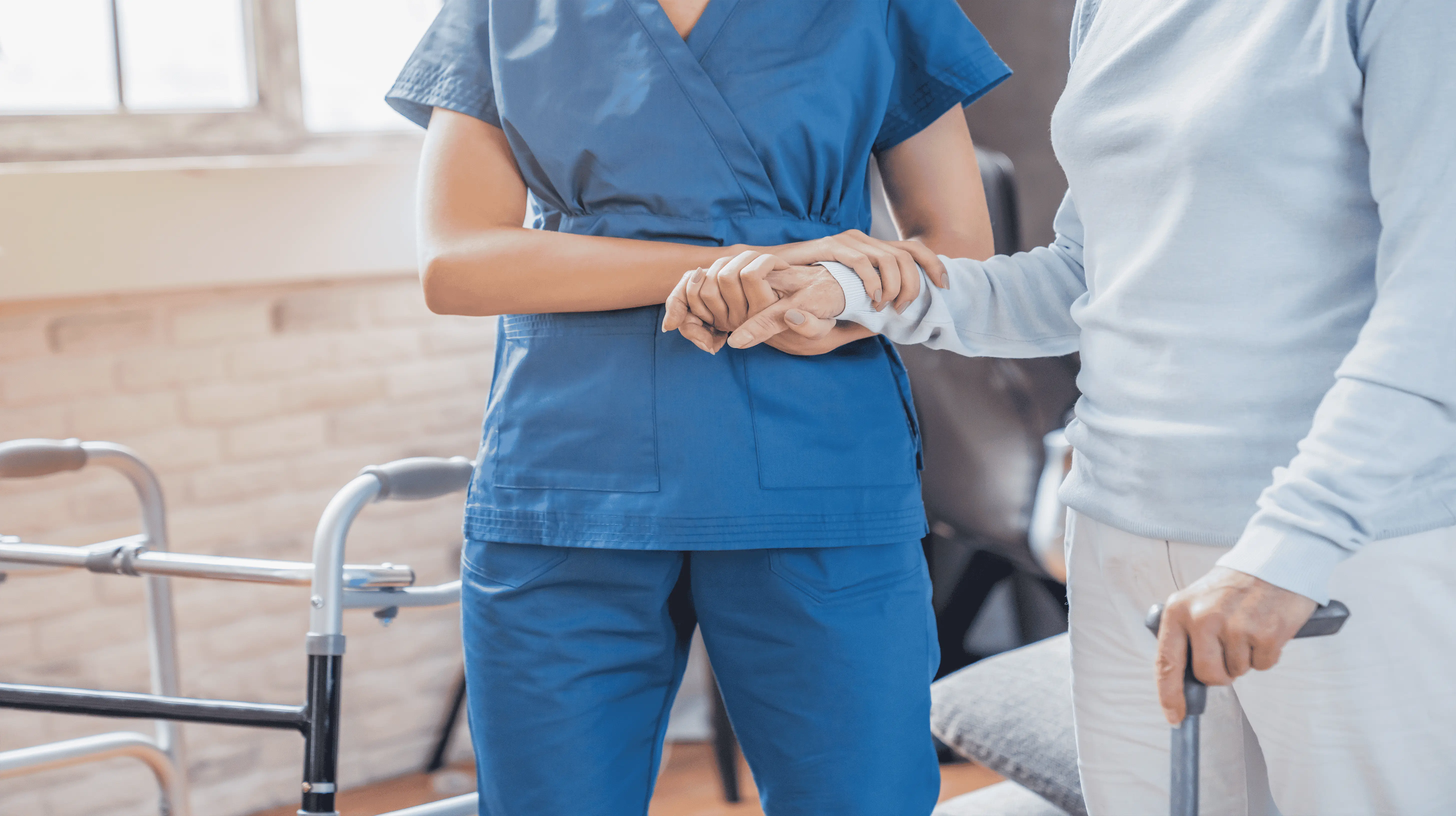 OC HomeCare nurse assisting senior client with mobility and personal care in a respectful, supportive home environment in Placentia, CA