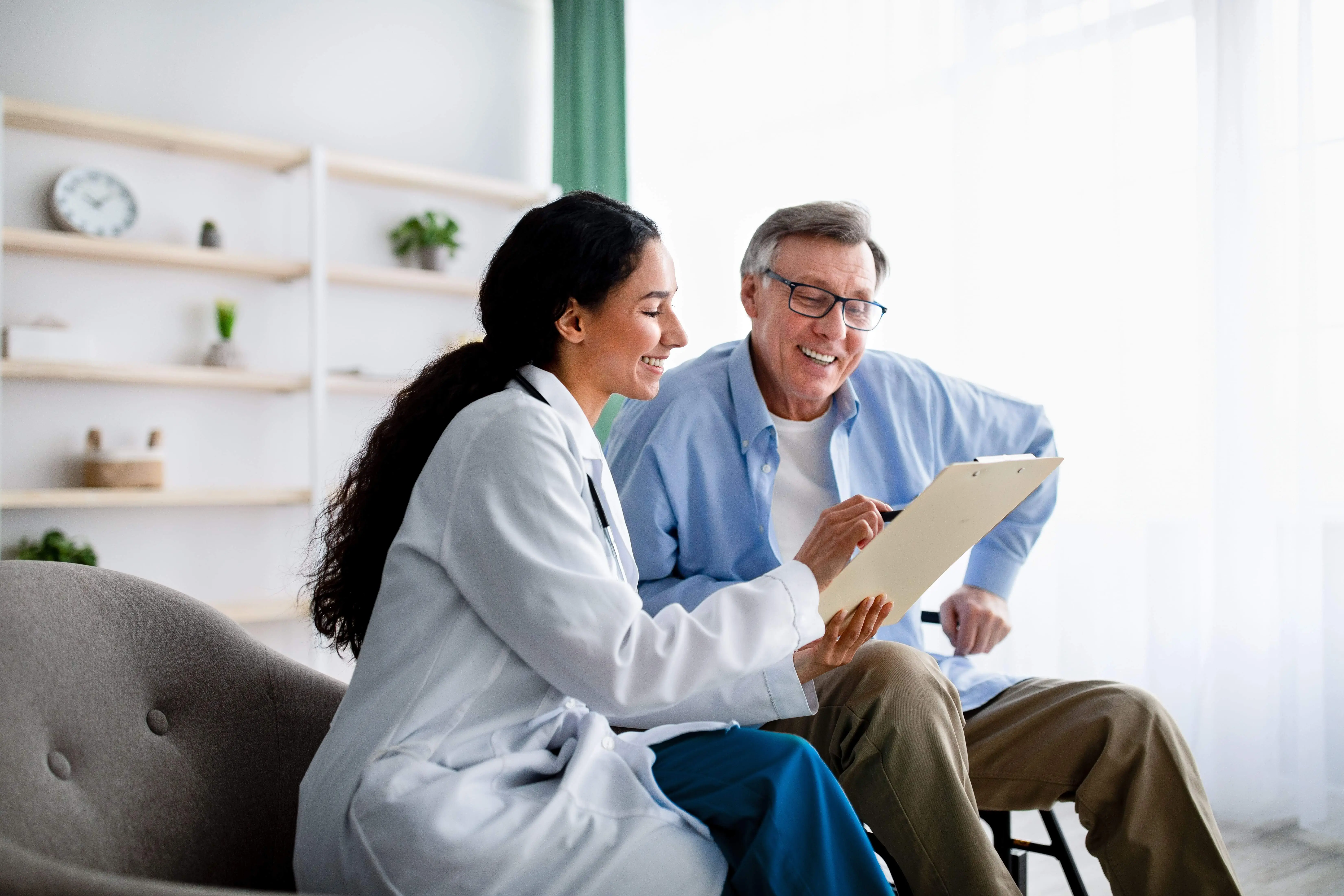 OC HomeCare nurse assisting a senior man in Cypress, CA with compassionate residential care planning and personalized support for long-term wellbeing